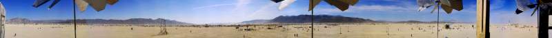 Panorama: Long panorama from Ziggurat at Burning Man 2001.  Note how city becomes a line
