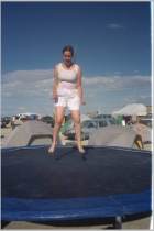 My Angel jumps into midair at the OCF trampoline.   Trampolines were very popular this year.  One was even up in a tower, but they took it down, perhaps it got unsafe.
