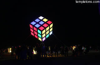 The cube didn't spin physically, but the lights would spin.  3 teams had to solve the cube.