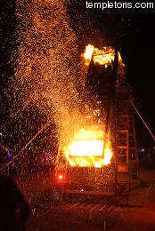 Metal cage with burning wood that spun and shot embers.  Simple but dramatic