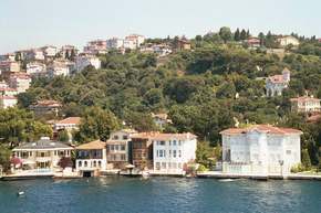 Some of the homes of the rich, right on the strait, with their pools and sunrooms and docks.  There are tons of these so while the average income in Turkey may not be so great, obviously a good number have the good life.
