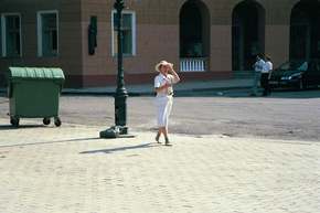 Here is a street performer in Odessa.   She has her box behind her for donations.  What's odd is that she's doing opera
