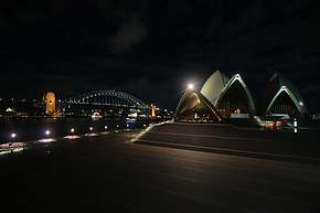 Popular land view of bridge and opera together at night
