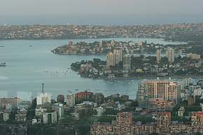 Various peninsulas leading all the way to the ocean show the scenic nature of Sydney at sunset