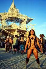 Body paint to be a walking nude Burning Man logo, shot in front of Mosoleum, by K.