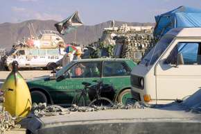 Some of the art cars parked in a row at Art Car camp
