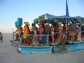 One of the first Porta-Parties heads out into the desert at sunset