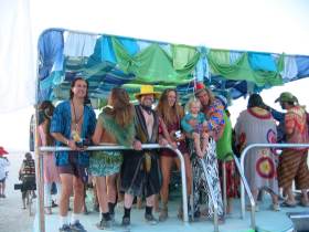 John Perry Barlow and friends cruise the playa on a Porta-Party
