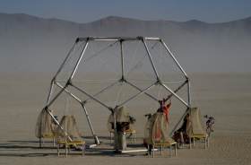 Dust rises behind a relaxing dodecahedron
