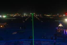 Standing on the Man, right over his laser pointing to center camp
