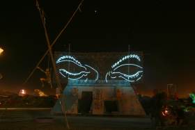 The Eyes of God, a detailed elwire animation which winked and blinked and drove around,.