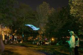 This guy had a radio controlled helicopter with LEDs, a time exposure shows its path.  It looks like a UFO