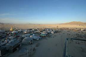 The open playa, at sunset, wide view