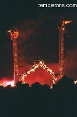The stage in full fire.  Note how Pepe, the designer, arranged to have the flames shoot out the mouths and eyes of his demons.
