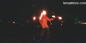 The burning ceremony starts with fire dancers