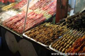 Is it just for the tourists?  Stall in the night market sells grasshopper, scorpion and other bugs on a stick.  Tasty and expeditious.