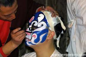 They paint the faces of the actors for the Beijing opera.  We skipped the opera, which deliberately sounds shrill, to tour the town at night.