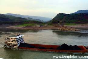Coal barges are everywhere.  Coal is the power of the river, and the destroyer of it.  Many mines will be underwater.