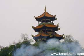 At the entrance to the gorge, smoke from a smoke-bomb set off to welcome us wafts past a Pagoda