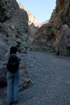 K. photographs sunlit rocks in Titus canyon