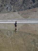 I stand in shallow Lake Badwater to take photographs -- and say I did it.
