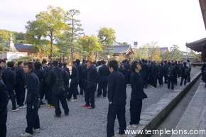 Kyoto is filled, filled with crowds of schoolchildren on one of the their three expeditions.  Usually the high school one.  Though the schools are mostly co-ed, they still tend to keep apart.  Here a crowd of boys waits near Sanjusangen-do Temple, with its 1001 Kannon statues