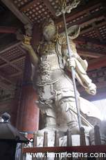One of the guardian deities of Buddhism at the corners.  I think this is Tamonten