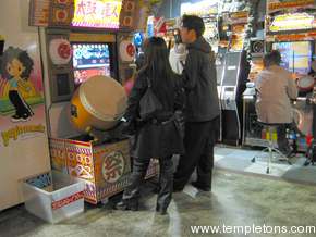 Typical video game parlour, of which they are many.  This corner featured musical games, with people playing drums and instruments to score points.