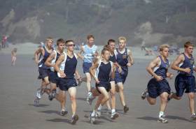 A team of racing high school athletes in a track meet on Agate beach made for a nice 