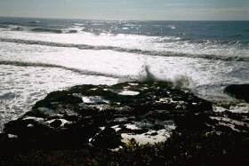 Various shots of crashing waves near Devil's Churn