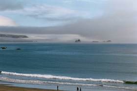 Fog rolls into the beach